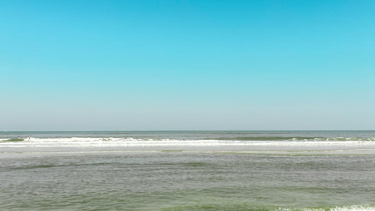 St. Augustine Beach in Florida with calm waters and soft natural light, ideal for a romantic couples escape